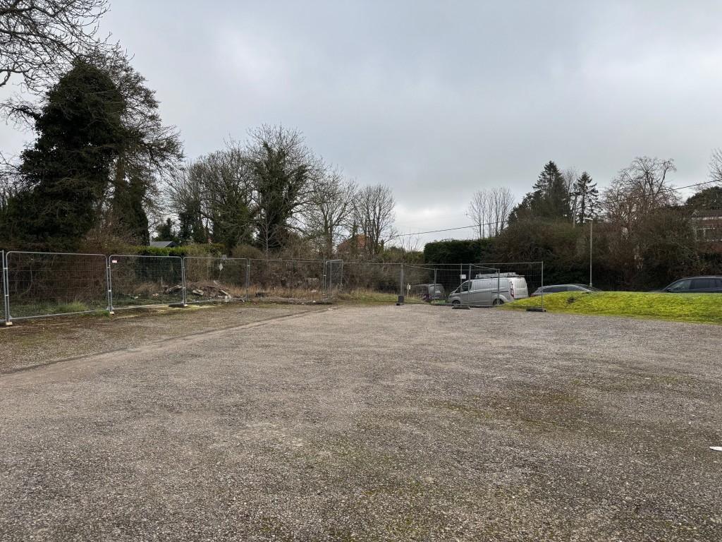 Lot: 92 - DEVELOPMENT SITE WITH CONSENT FOR A PAIR OF SEMI-DETACHED HOUSES - View from the rear of the site looking towards the road